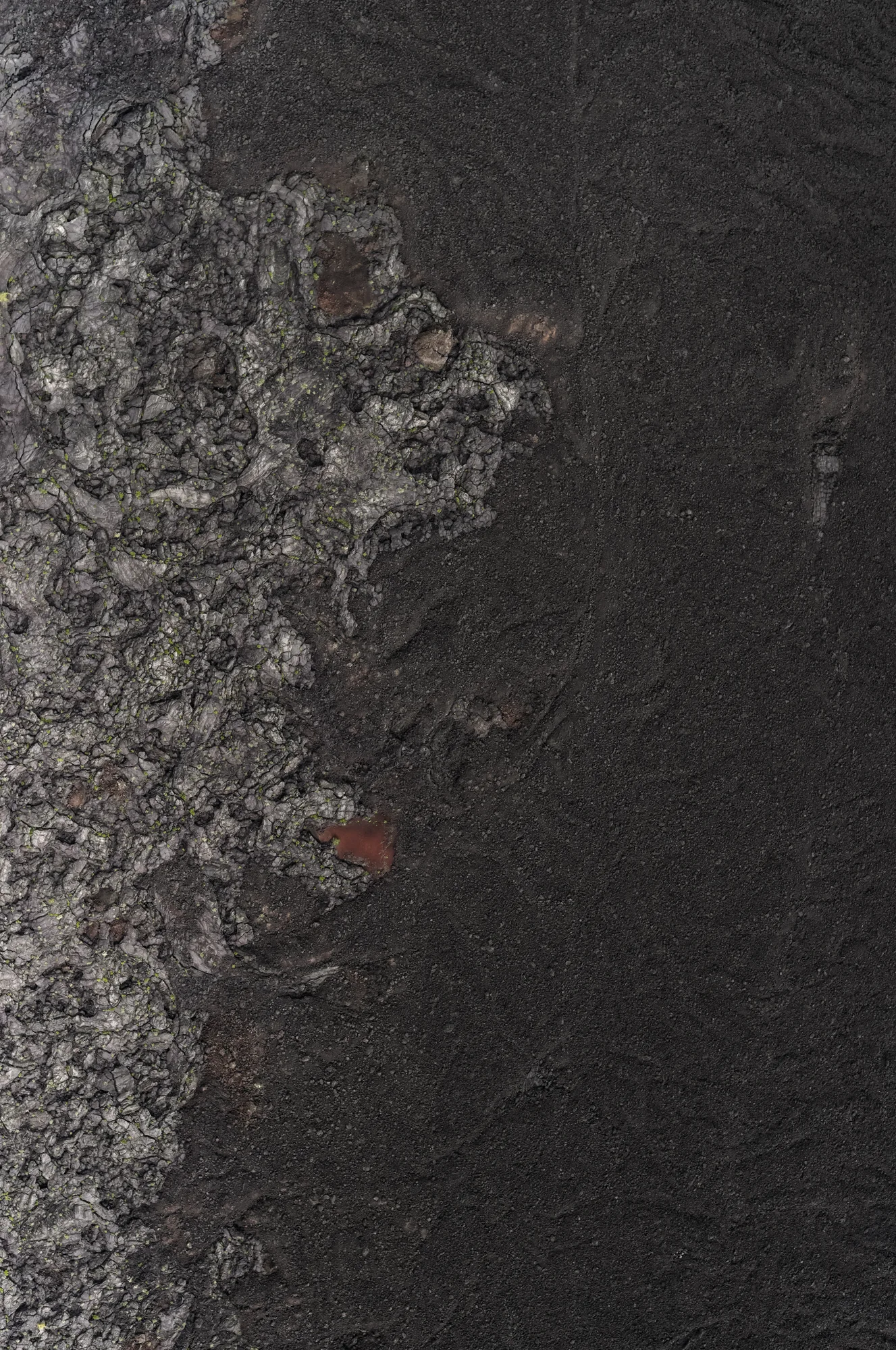 Dark volcanic terrain from Craters.
